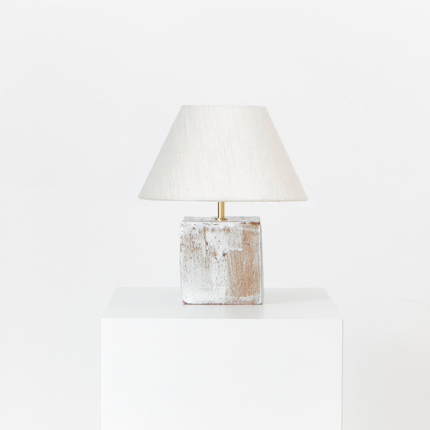 Arouca Table Light in White on Textured Brown Clay Table Lamps