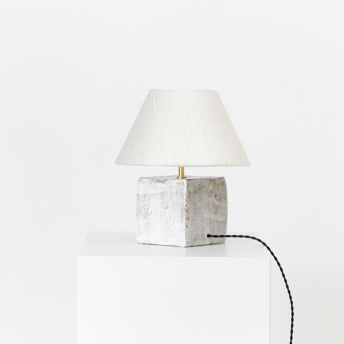 Arouca Table Light in White on Textured Brown Clay Table Lamps