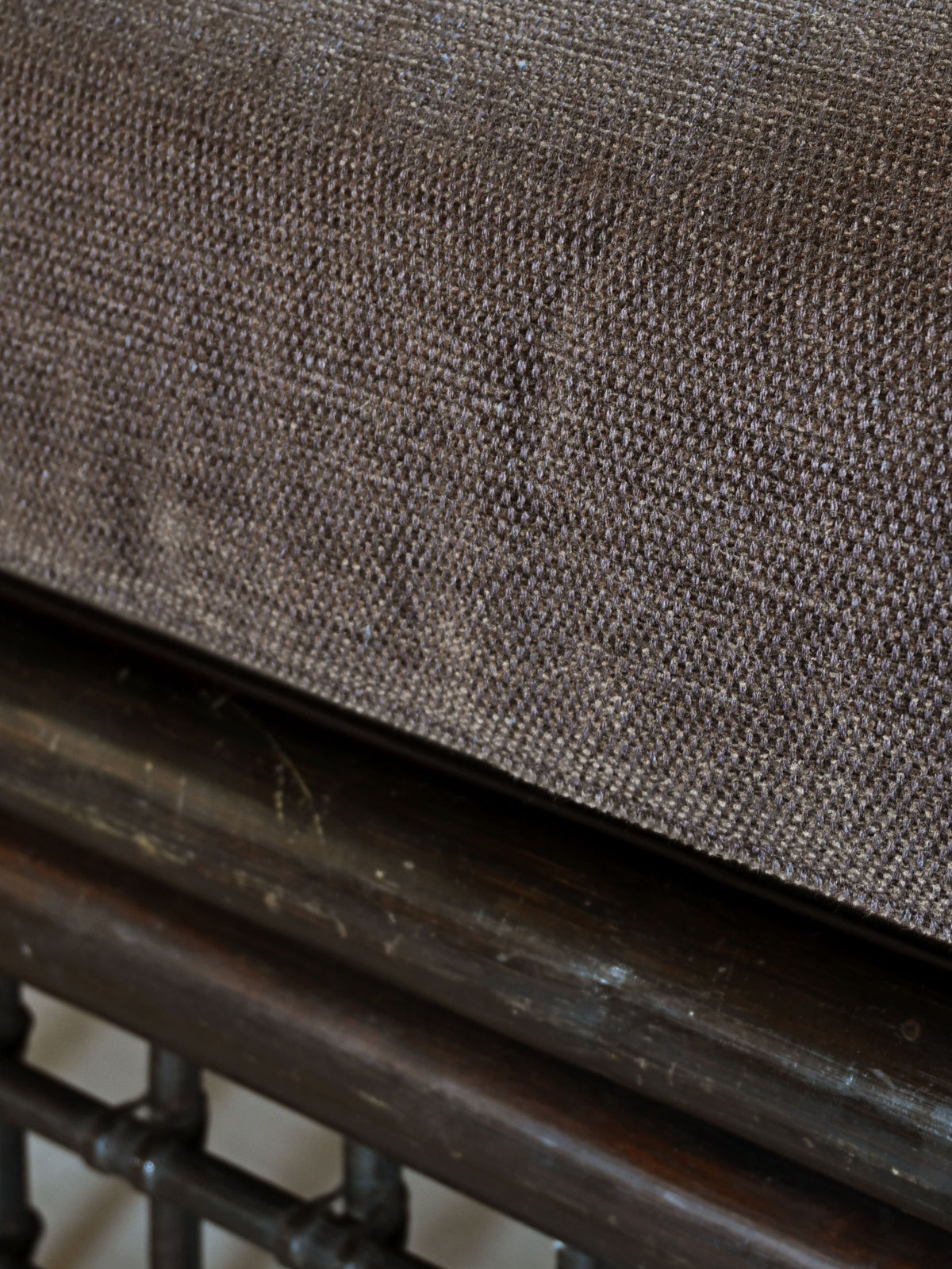 Afra and Tobia Scarpa "Basilian" armchair for B&B Italia, detail of the woven cushion fabric and bamboo rail
