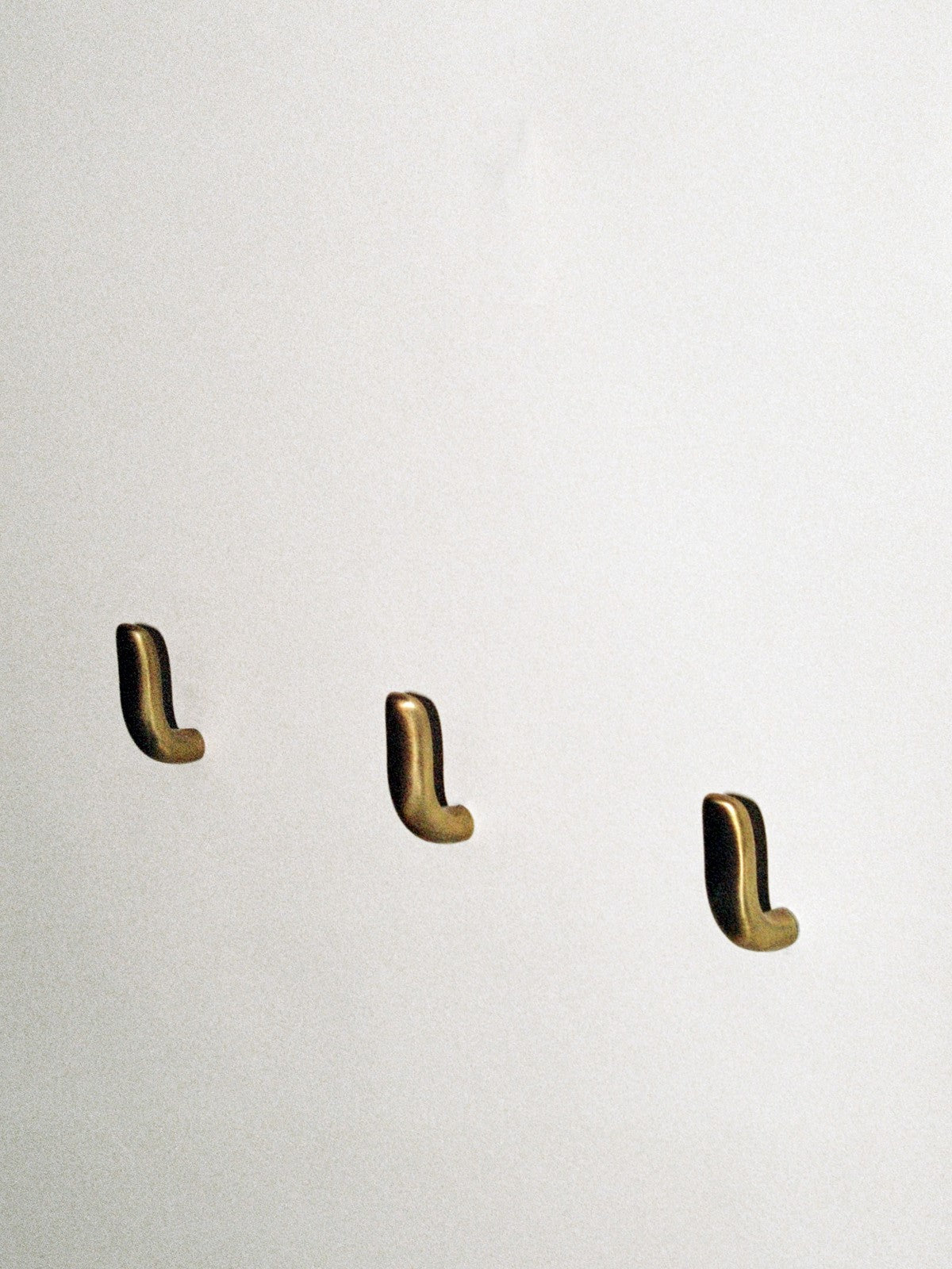 Iris Hook - Amber Brass Hardware