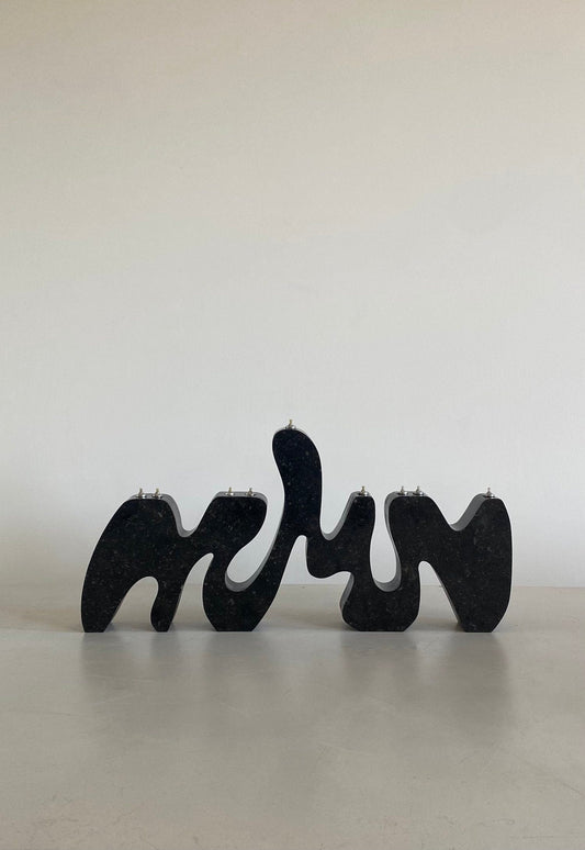 Granite Menorah Sculpture by Hannah Polskin