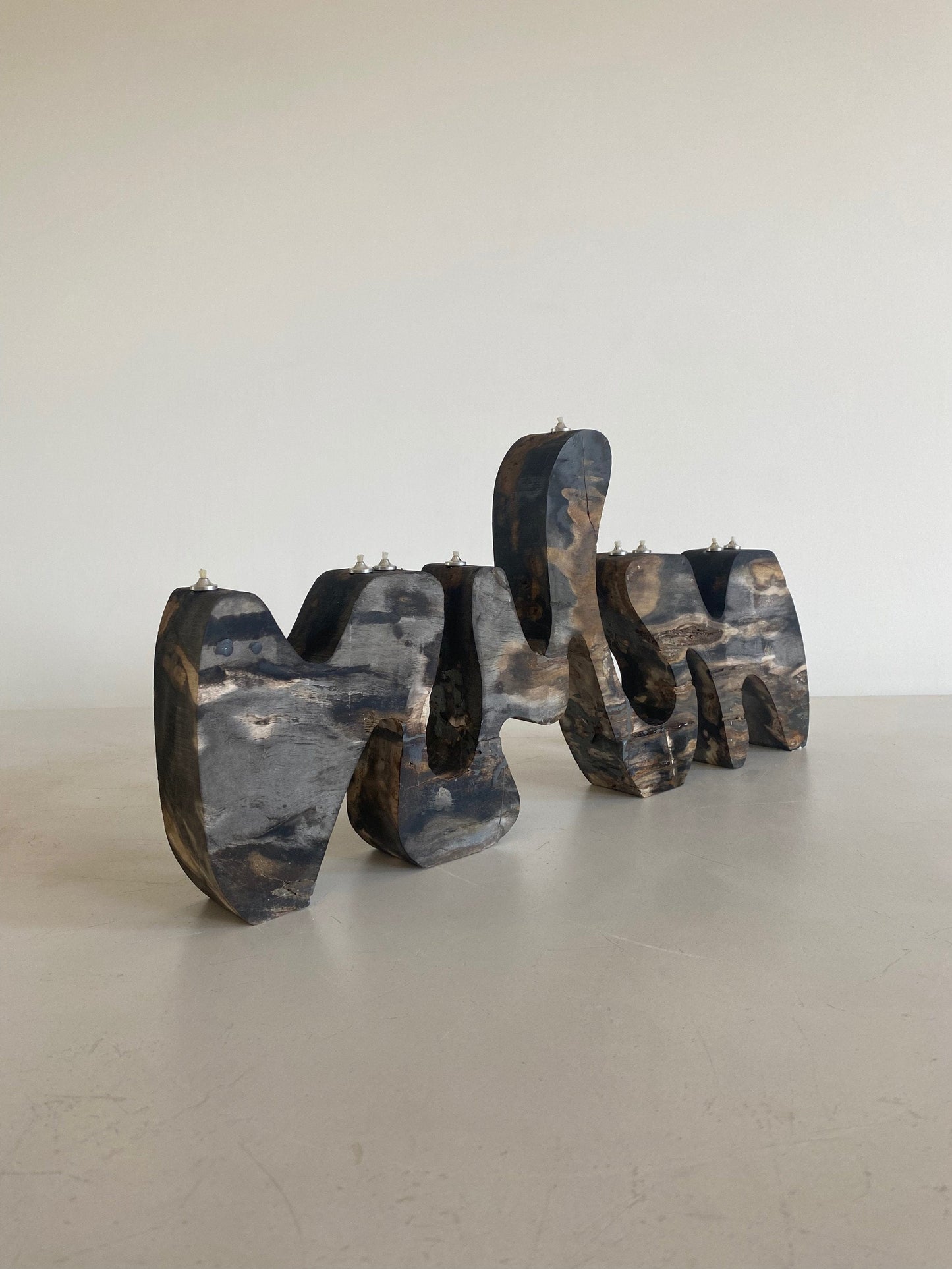 Petrified Wood Menorah Sculpture by Hannah Polskin