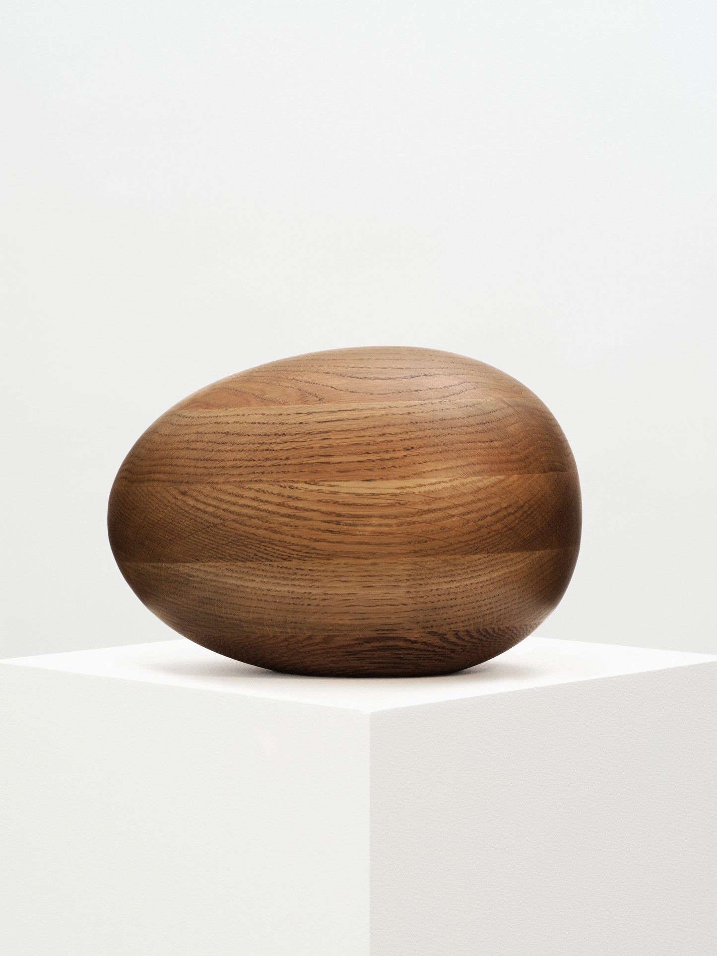 Smoked Oak Egg Sculpture sculptures