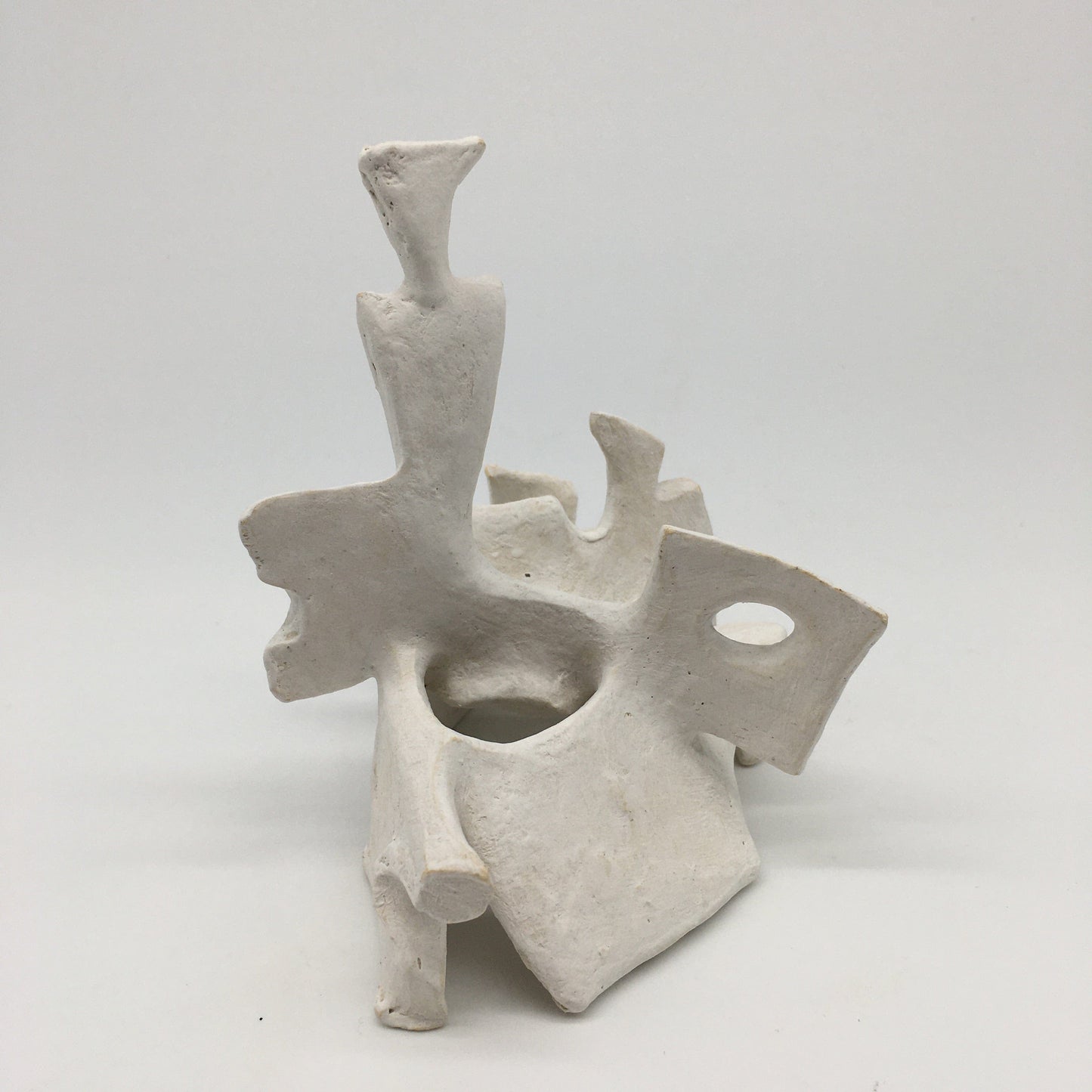 WHITE UNDERGLAZE ON STONEWARE SCULPTURE BY EVAMARIE PAPPAS-OGLANDER