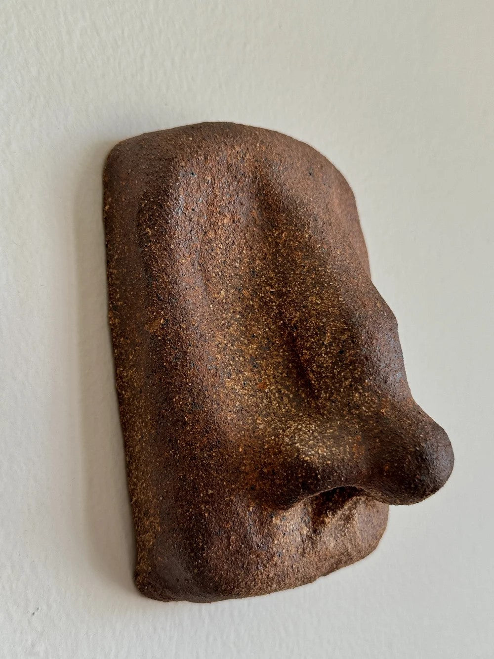 A Hanging Nose Sculpture by Le Minou Studio