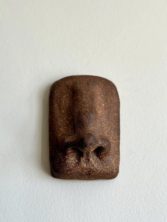 A Hanging Nose Sculpture by Le Minou Studio Sculptures