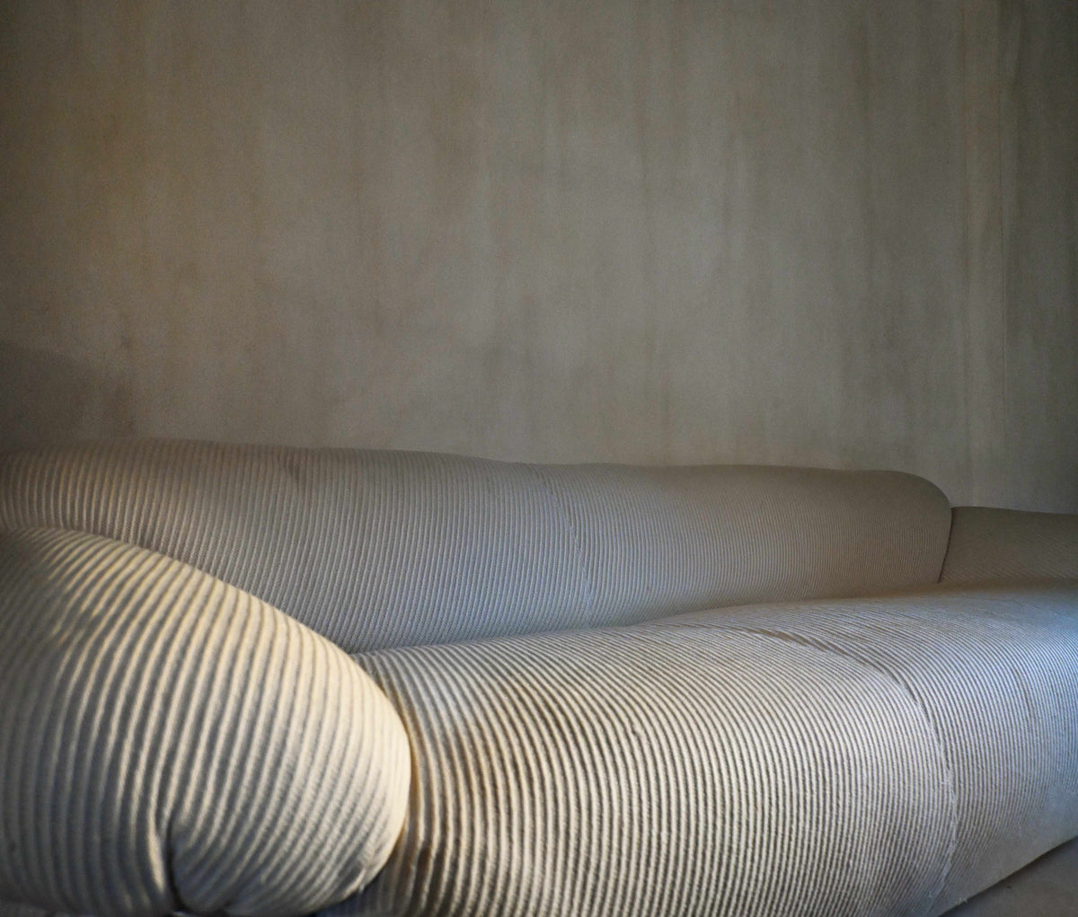 Gianfranco Frattini "Sesann" seating, the sofa seen at an angle, horizontal format