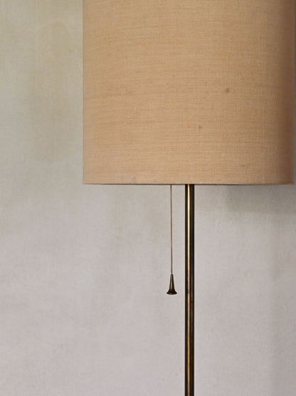 brass and fabric "Trottola" floor lamp, closer view of the shade and pull cord
