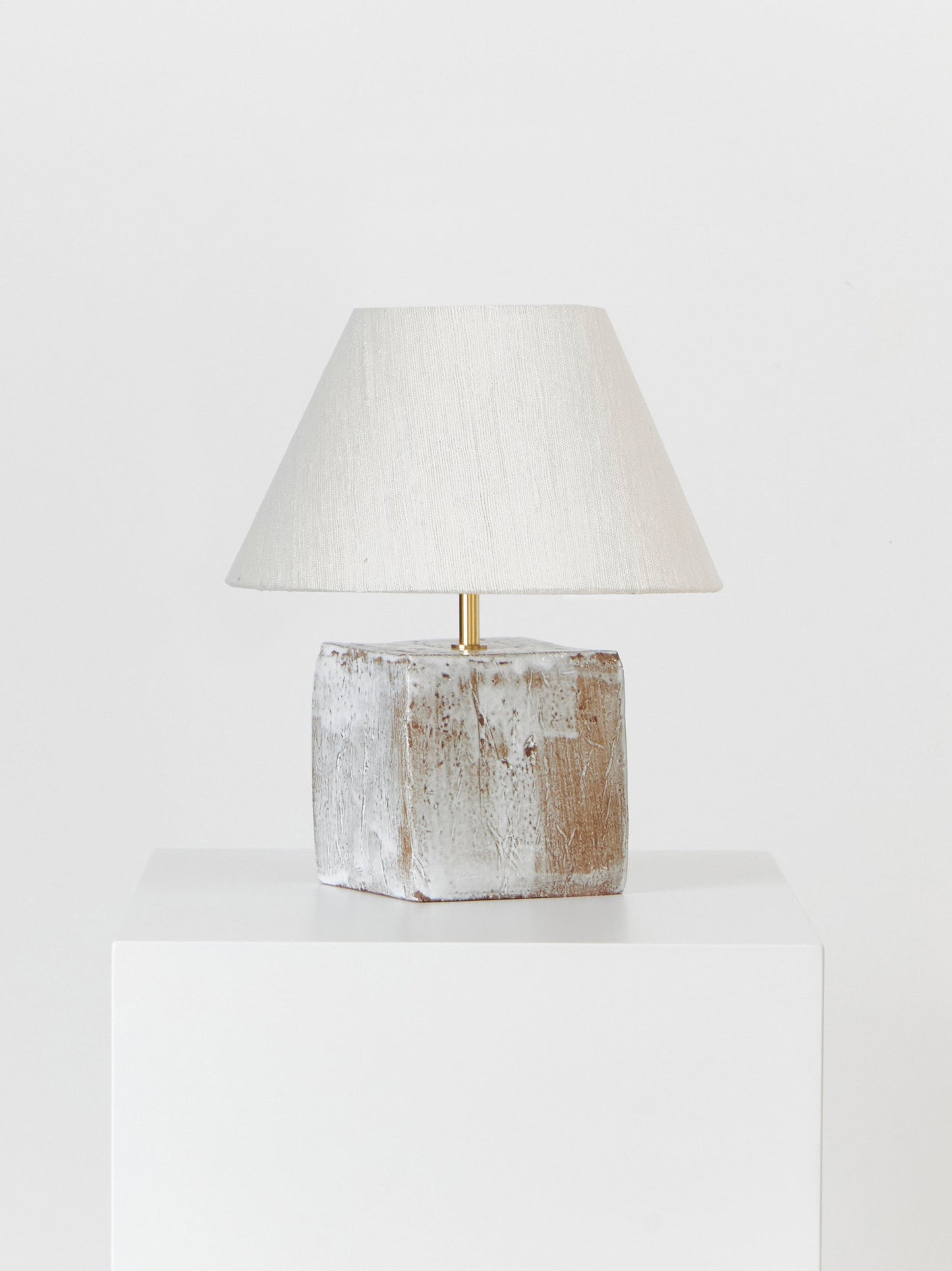 Arouca Table Light in White on Textured Brown Clay Table Lamps