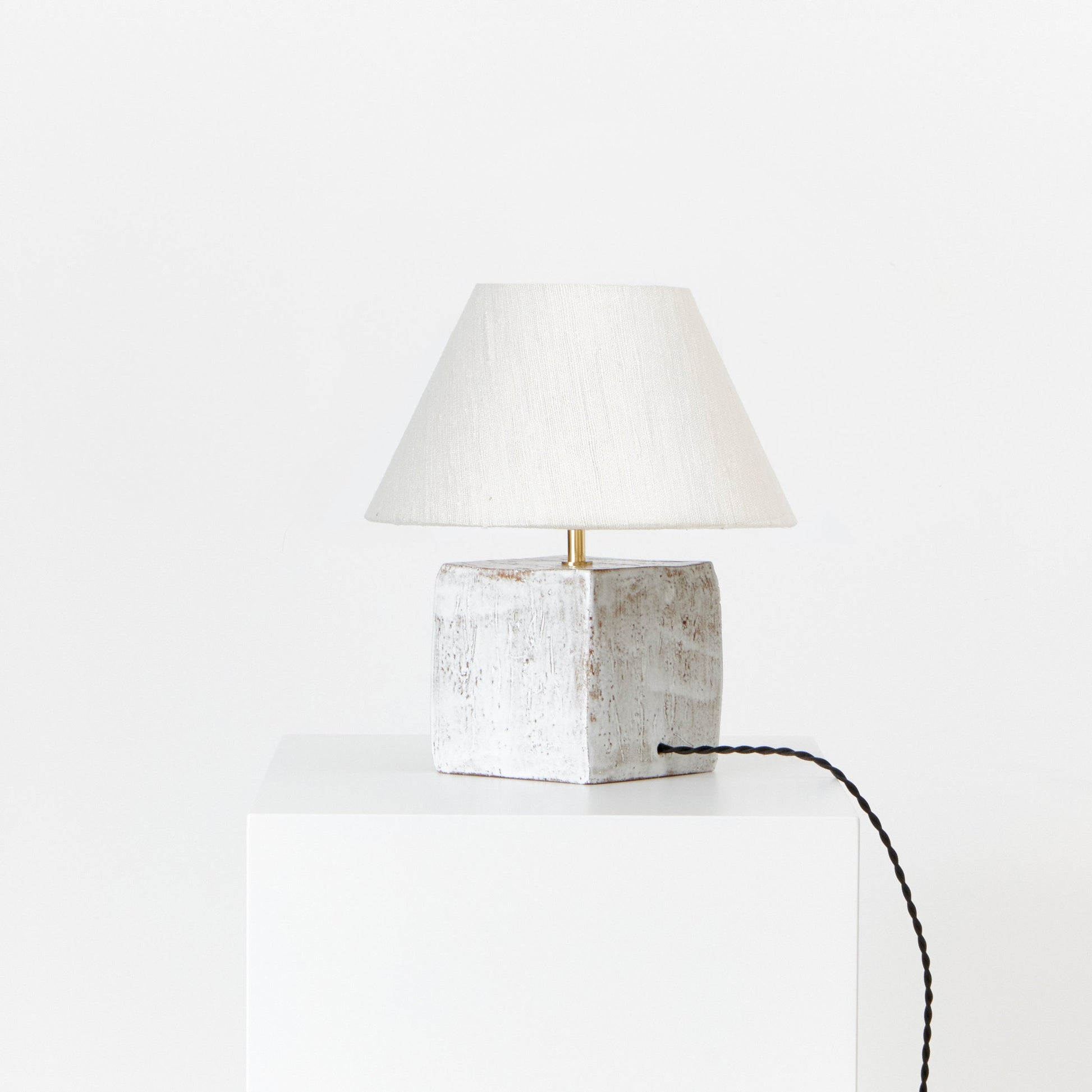 Arouca Table Light in White on Textured Brown Clay Table Lamps