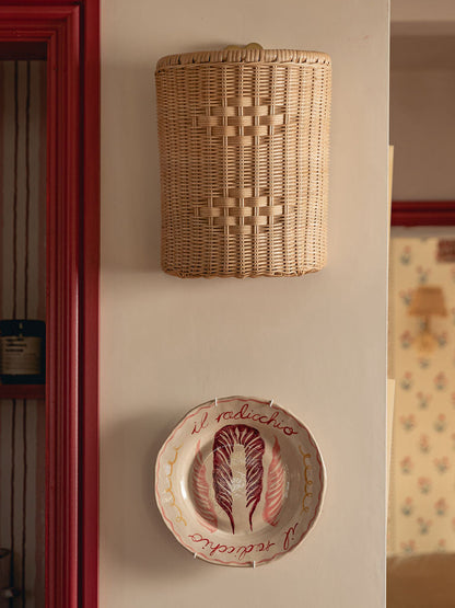 Beatrice Wall Light Shade, Natural, mounted in a hallway above a decorative plate