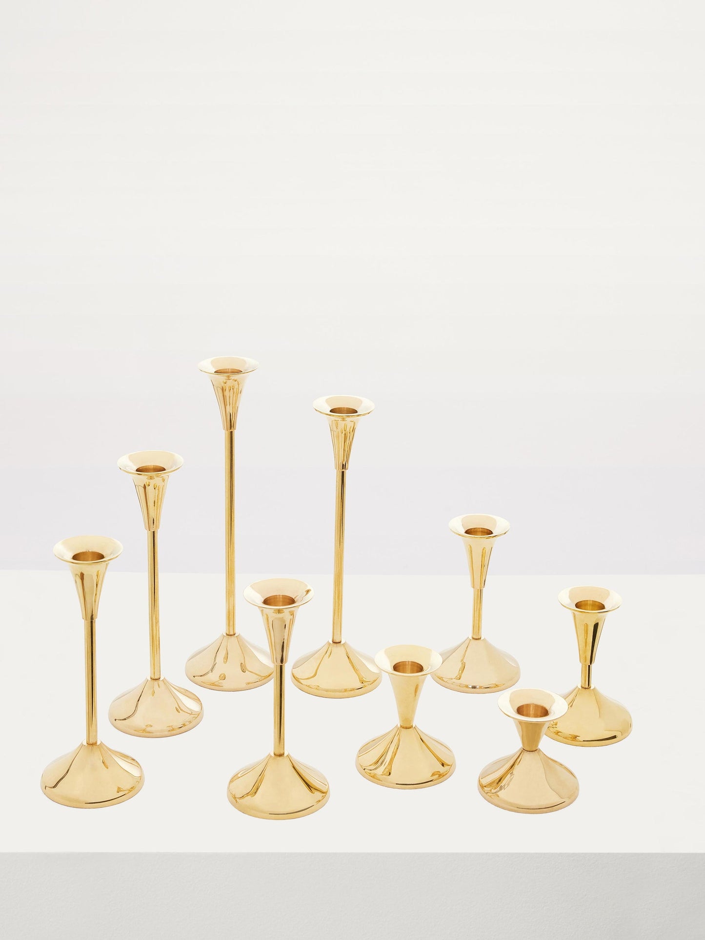 Brass Set of Nine Candlesticks Candle Holders