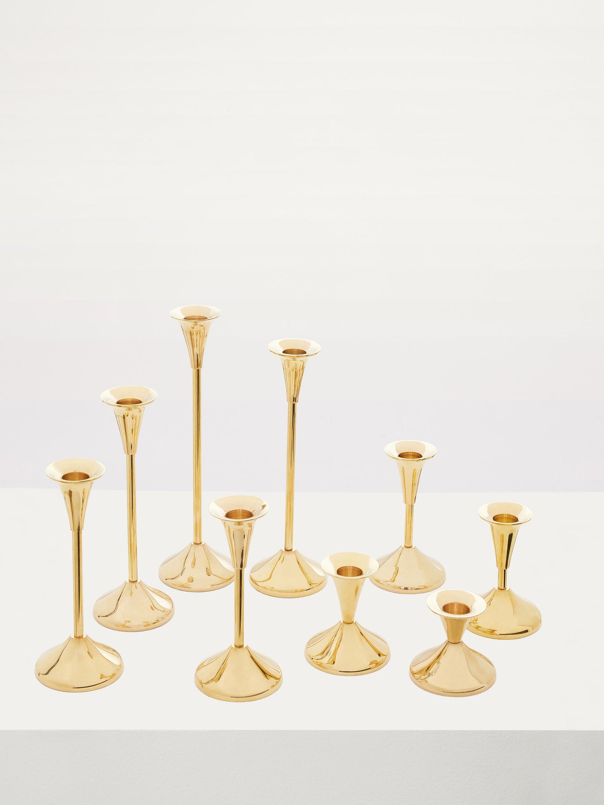 Brass Set of Nine Candlesticks Candle Holders