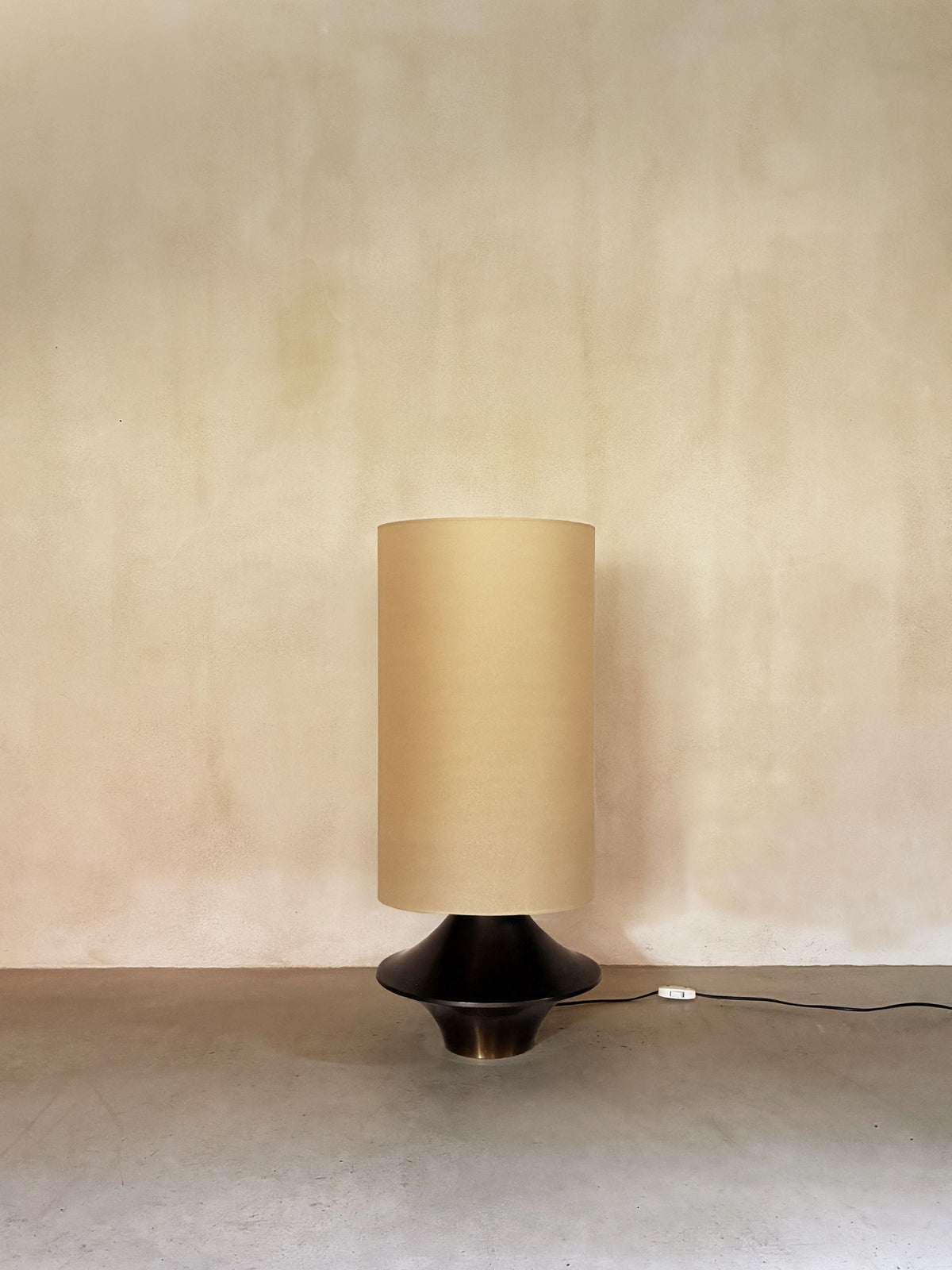 bronze lamp with parchment shade, unlit, bronze base and parchment shade