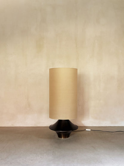 bronze lamp with parchment shade, unlit, bronze base and parchment shade