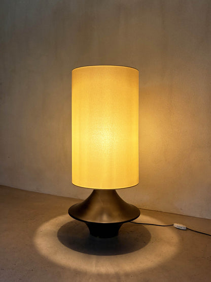 bronze lamp with parchment shade, lit, seen closer