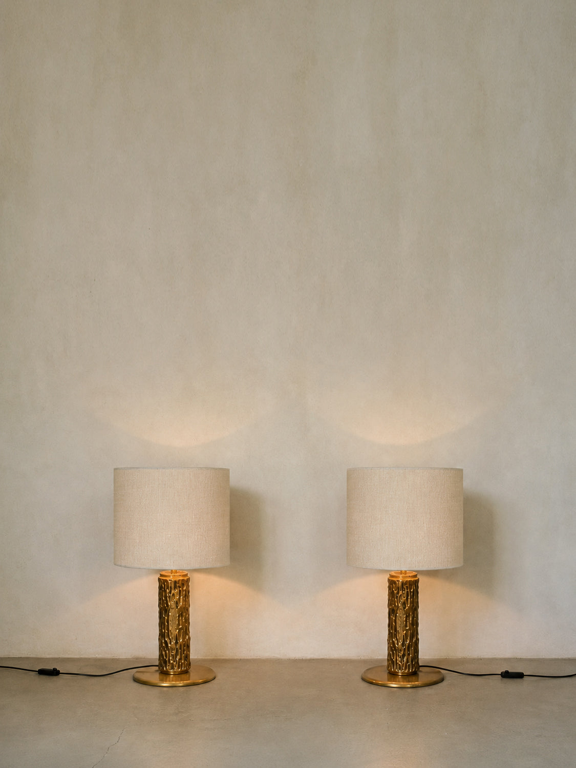 Luciano Frigerio cast metal table lamps, pair, the pair lit, shades glowing