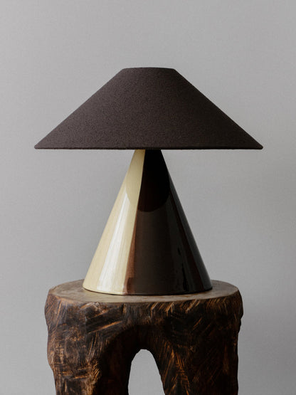 Caterina Table Lamp in Butter Ristretto, on a carved wooden stool