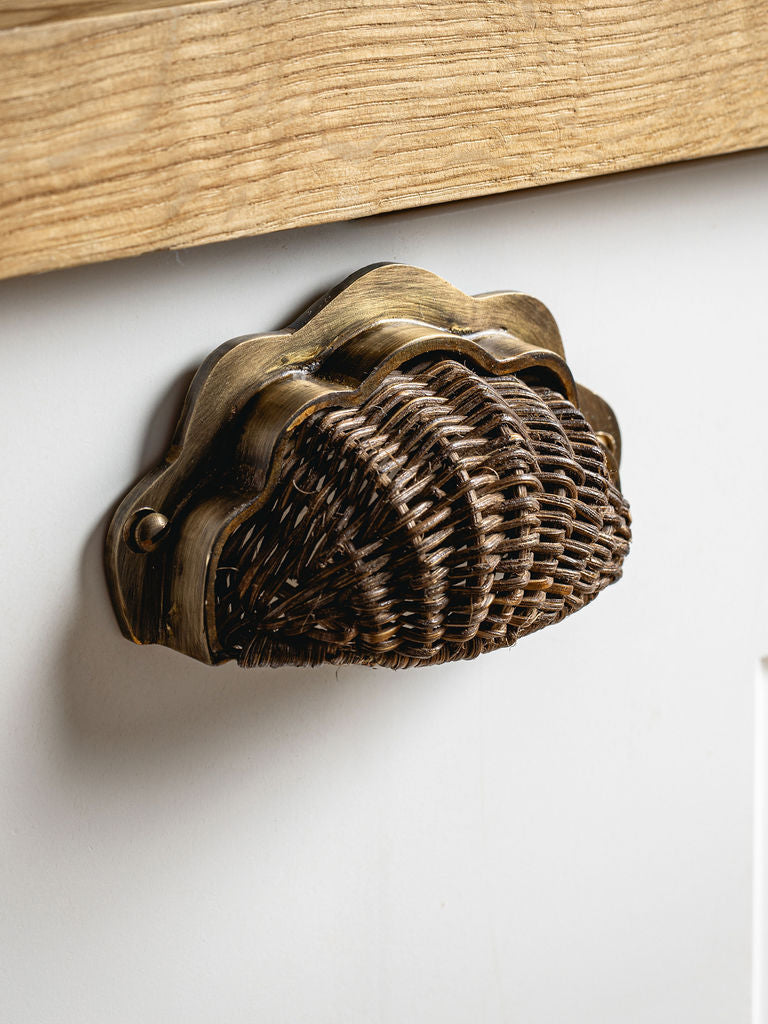 Delilah Cup Handle, Aged & Teak, installed on a wooden drawer front