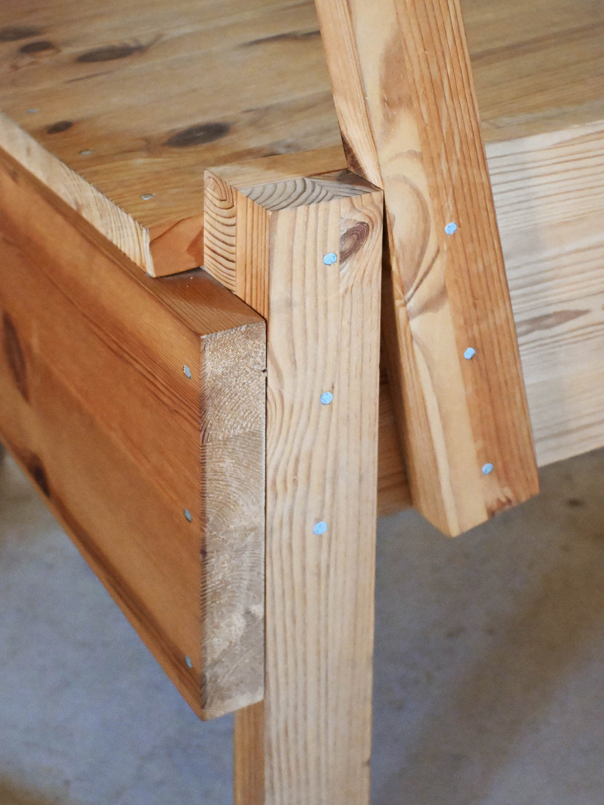 Enzo Mari chair for Artek, detail of a leg and the nailed frame