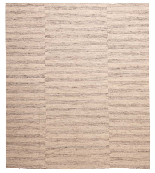 Flat-weave Rug in Sand, overhead view of the full sand and ivory wool rug