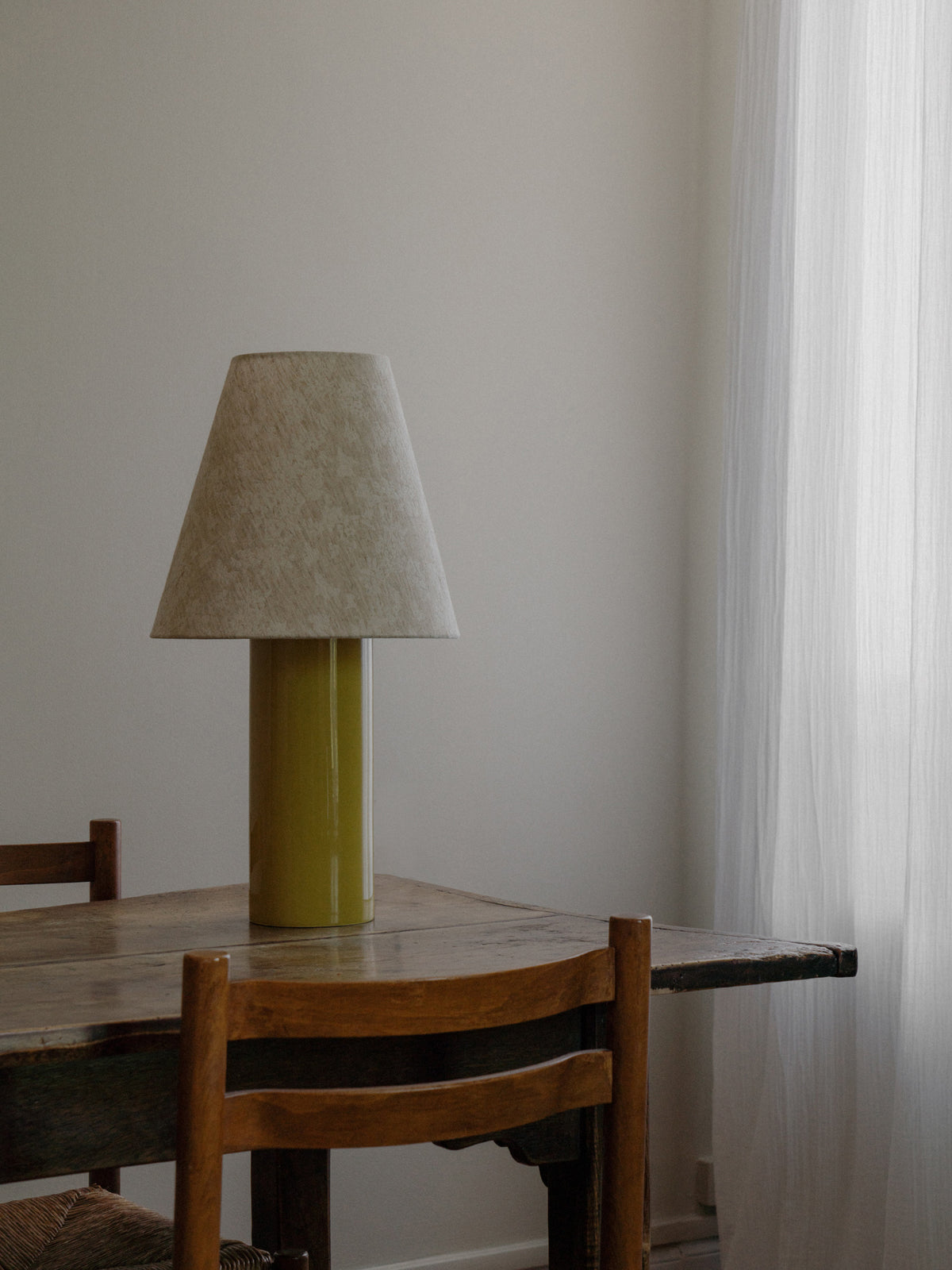Giro Table Lamp in Chartreuse Florale, on a dining table, wider view