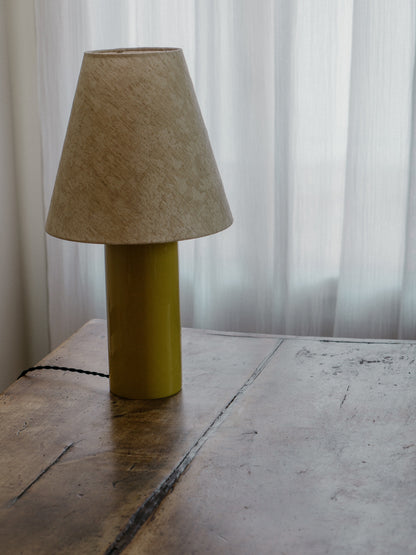 Giro Table Lamp in Chartreuse Florale, on a wooden table, side view