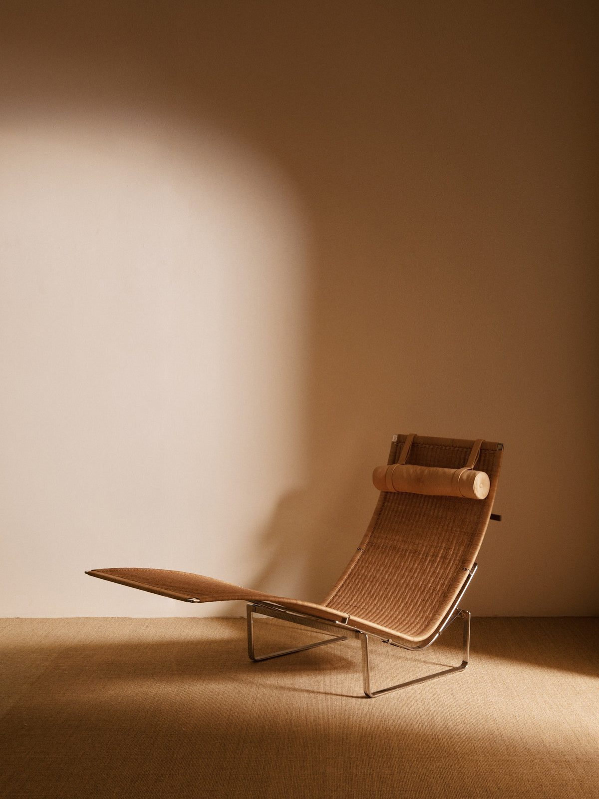Poul Kjærholm 2003 PK24 Lounge Chair, Stainless Steel, Natural Leather and Cane Webbing Chaise Lounges