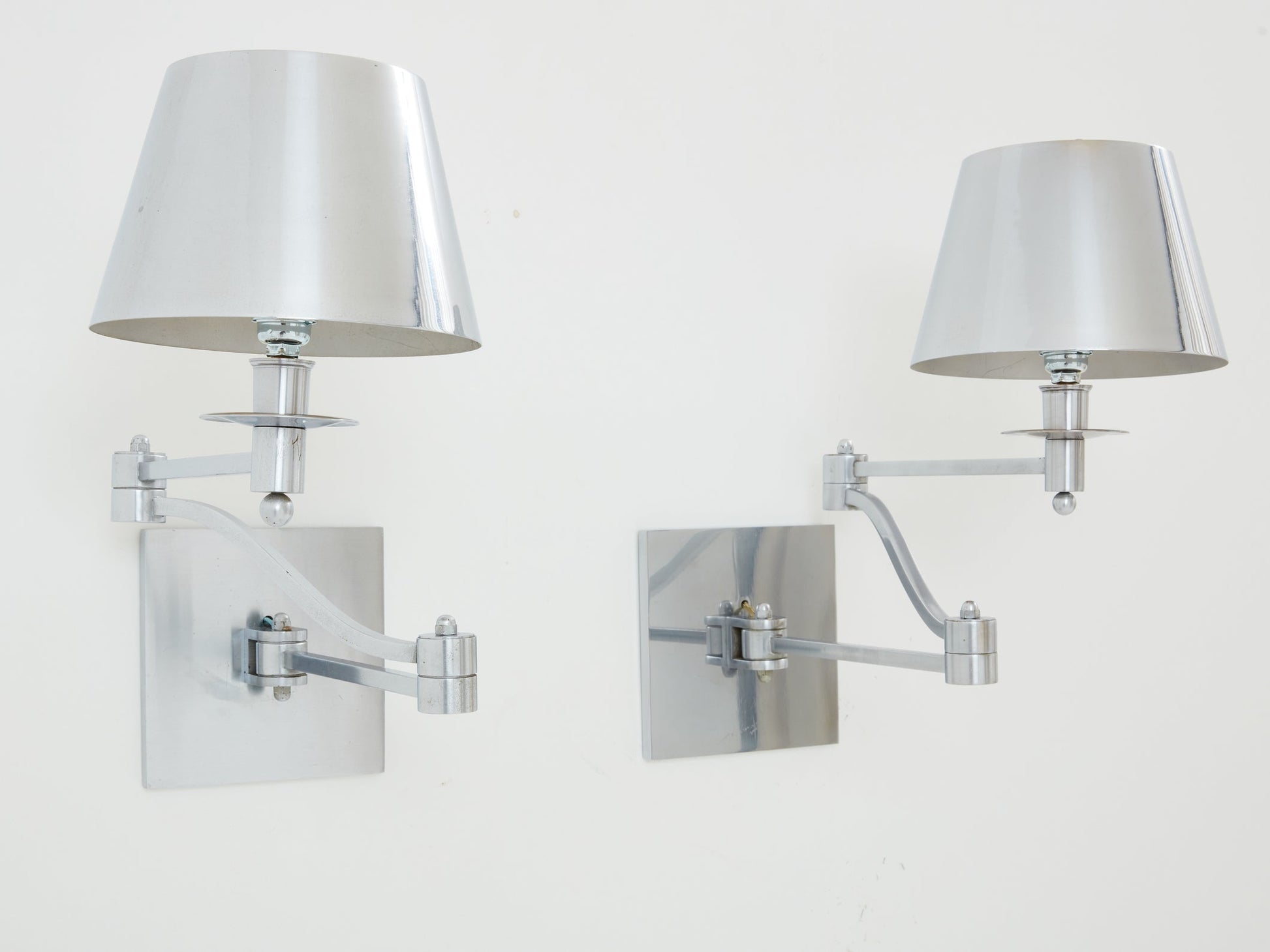 Maison Charles Pair of Brushed Steel Adjustable Swing-Arm Sconces 1960 Sconces