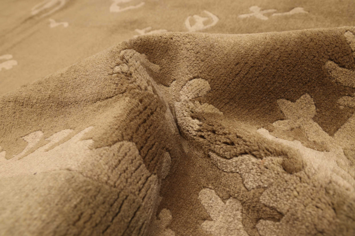 Nepalese Rug in Olive, folded to show the wool pile