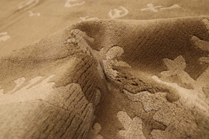 Nepalese Rug in Olive, folded to show the wool pile