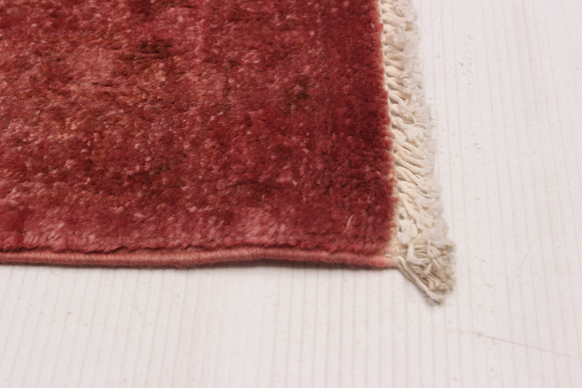Overdyed Rug in Cranberry, corner and edge detail