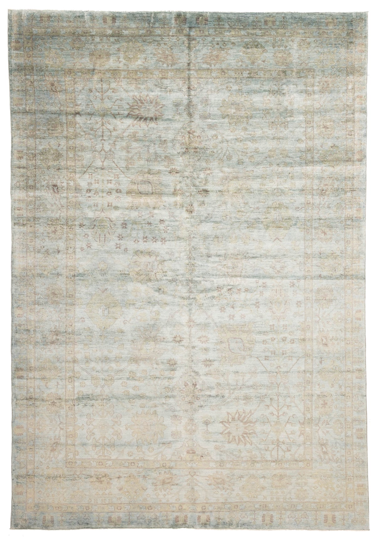 Overdyed Rug in Fog, overhead view of the full pale gray green wool rug
