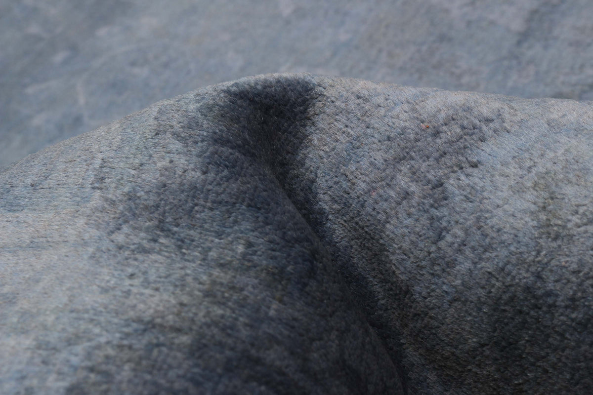 Overdyed Rug in Indigo, folded to show the wool pile