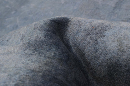 Overdyed Rug in Indigo, folded to show the wool pile