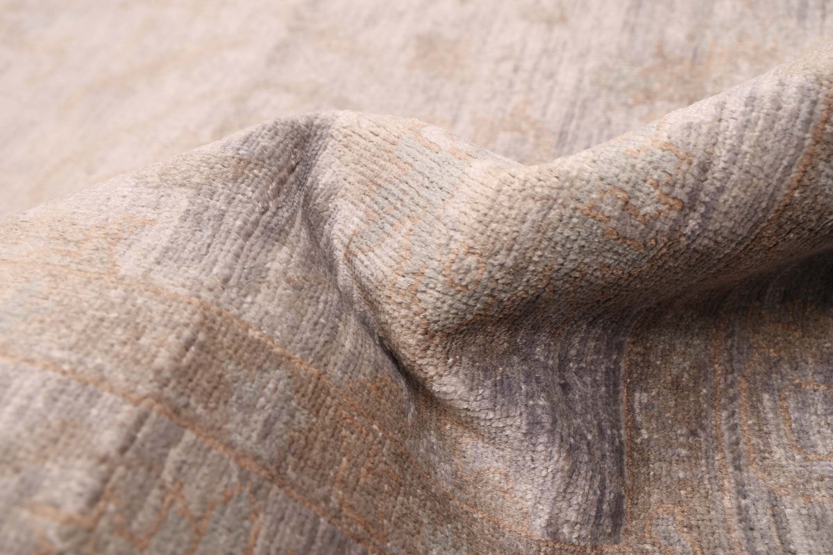 Overdyed Rug in Pebble, folded to show the wool pile