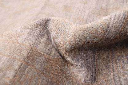 Overdyed Rug in Pebble, folded to show the wool pile