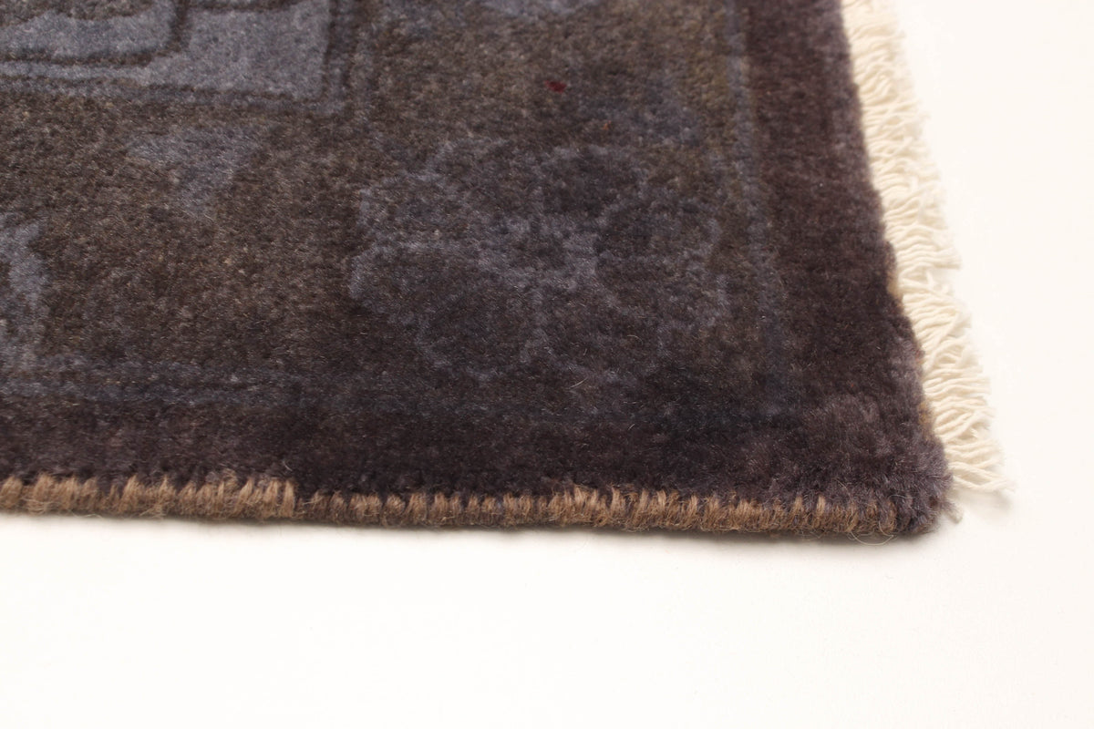 Overdyed Rug in Plum, corner and edge detail