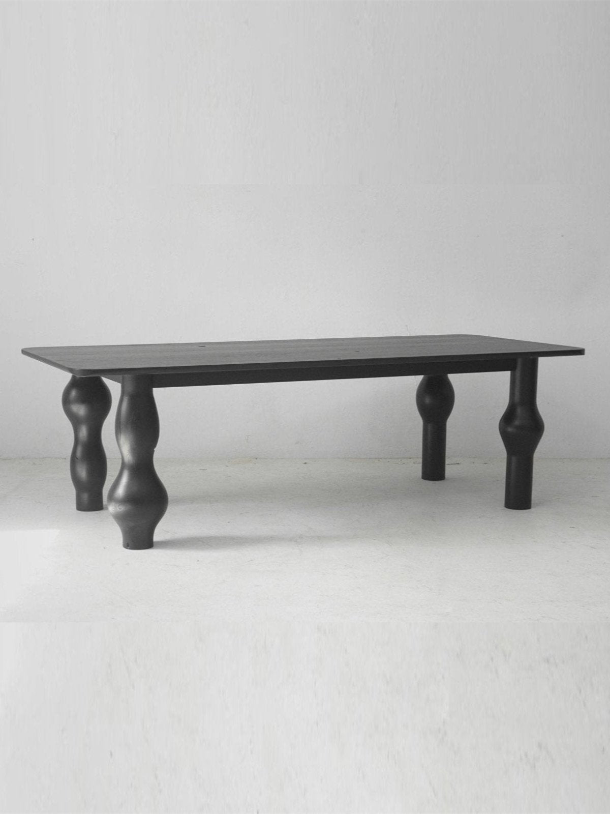 Oyster Dining Table in Black Dining Tables