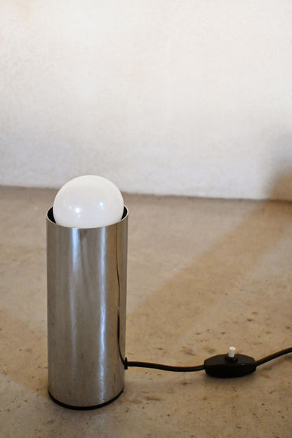 Enrico Tronconi chrome table lamps, pair, close view of one lamp, chrome body and exposed bulb