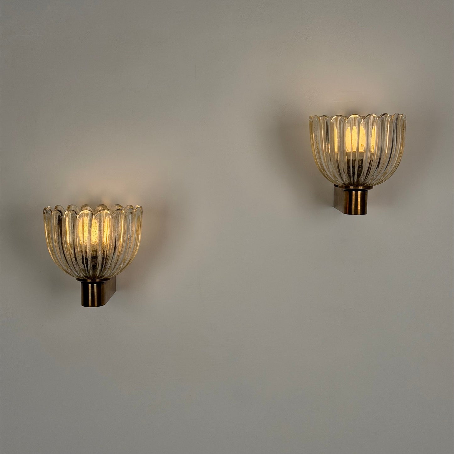 Pair of Murano Crystal Sconces with Suspended Gold Leaf Particles by E. Barovier Sconces