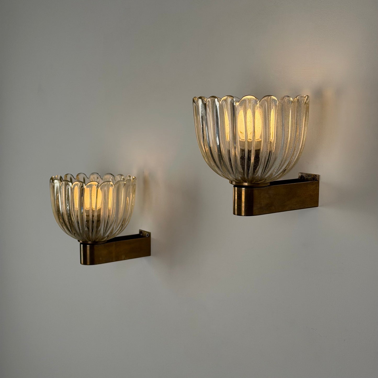 Pair of Murano Crystal Sconces with Suspended Gold Leaf Particles by E. Barovier Sconces