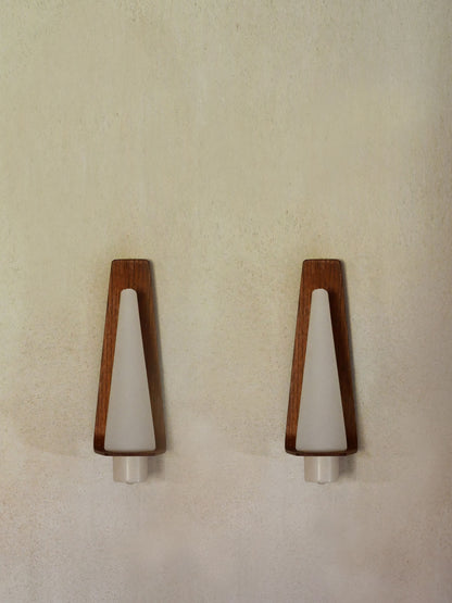 "Pinetti" wood and frosted glass sconce, the pair without shades, seen closer