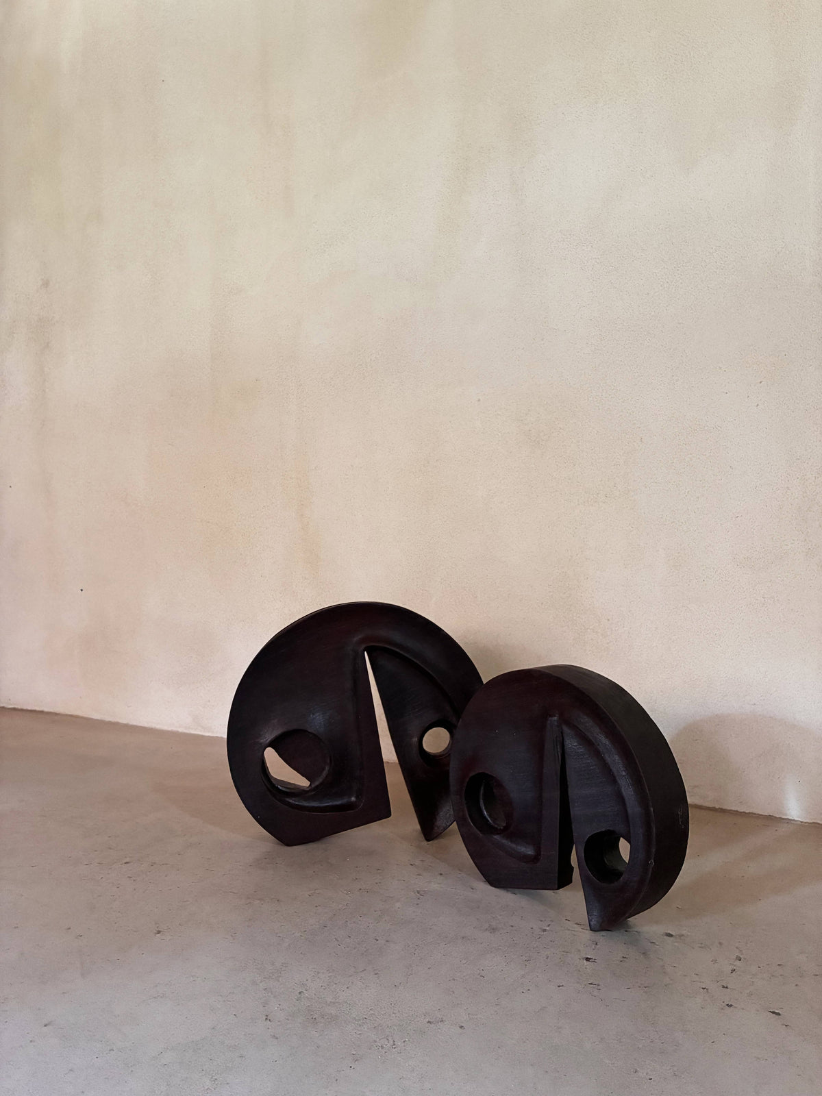 Gianni Pinna carved padouk wood sculpture, the pair seen closer, apertures aligned