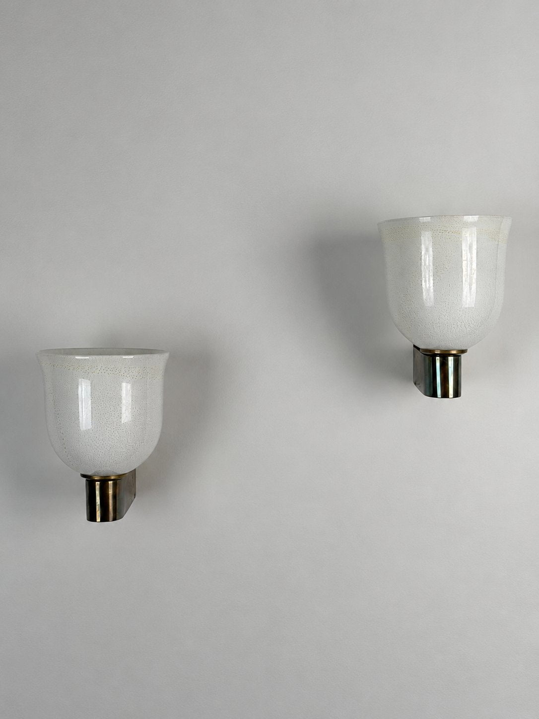Rare Pair of Tomaso Buzzi "Tulip-Shaped Lattimo Incamiciato" Sconces for Venini, 1930s Sconces