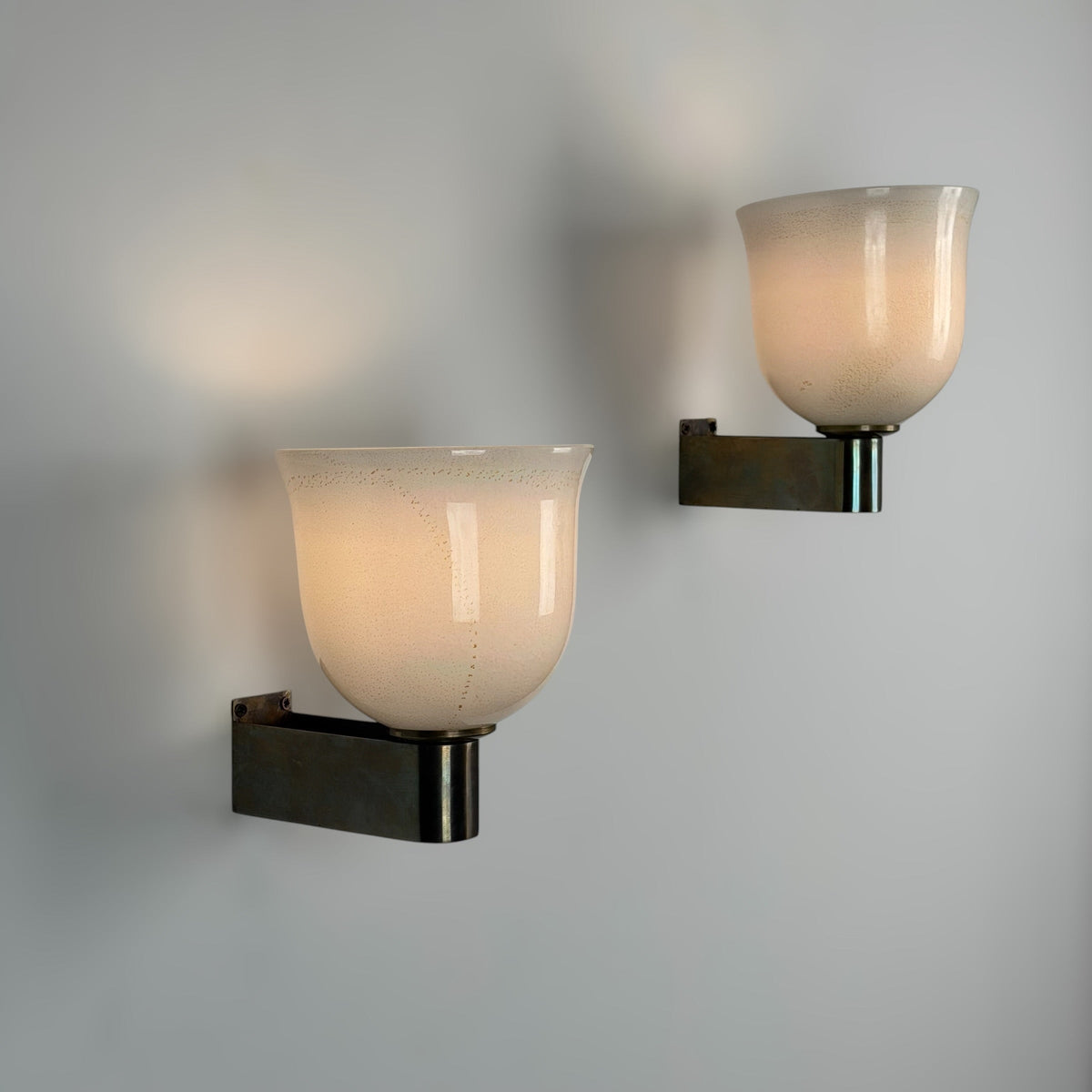 Rare Pair of Tomaso Buzzi "Tulip-Shaped Lattimo Incamiciato" Sconces for Venini, 1930s Sconces