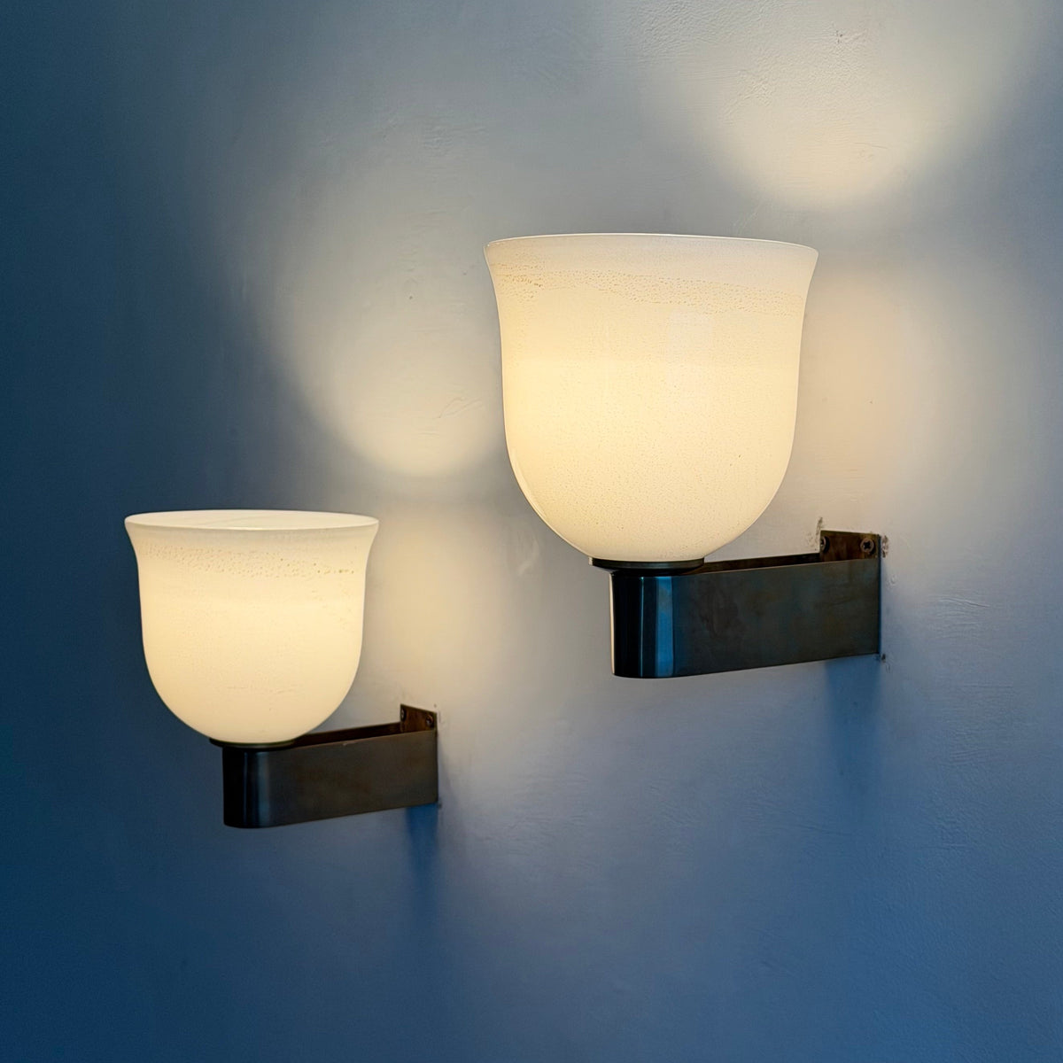 Rare Pair of Tomaso Buzzi "Tulip-Shaped Lattimo Incamiciato" Sconces for Venini, 1930s Sconces