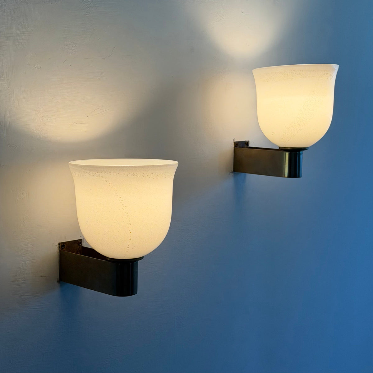 Rare Pair of Tomaso Buzzi "Tulip-Shaped Lattimo Incamiciato" Sconces for Venini, 1930s Sconces