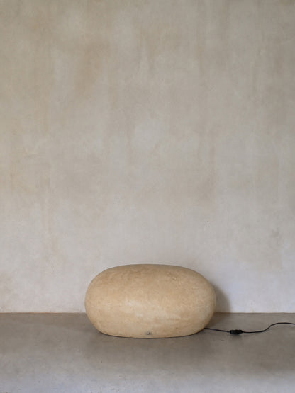 "Sasso" fiberglass lamp, unlit, the oyster fiberglass boulder form on the floor