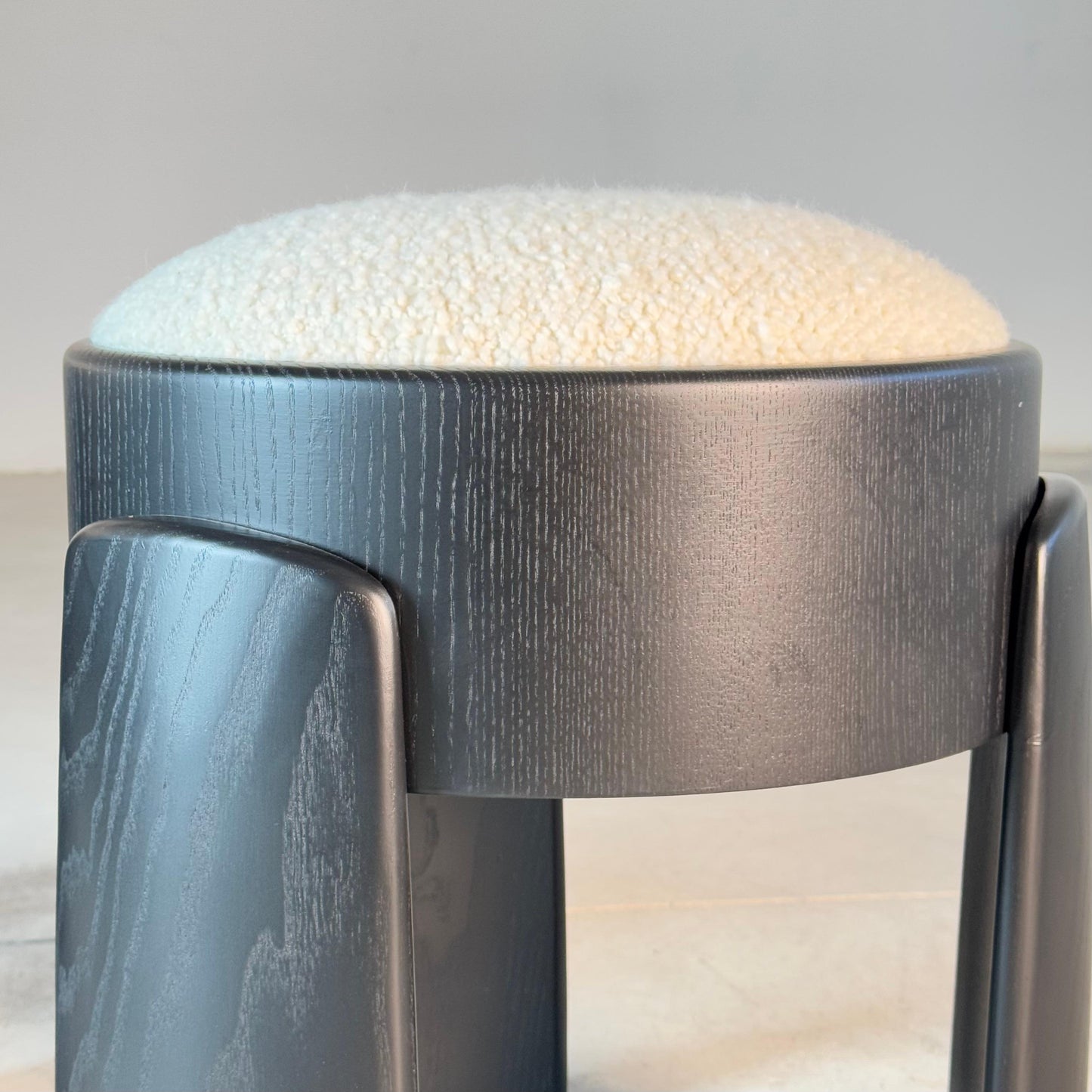 Sculptural Pair of Black Ash Wood Stools with Dedar Milano Boucle Ivory by FORME Stools